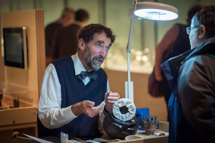 Michael Lloyd demonstrating silversmithing at the National Museum of Scotland as part of the company's exhibition 'The Silversmith's Art' in 2015.