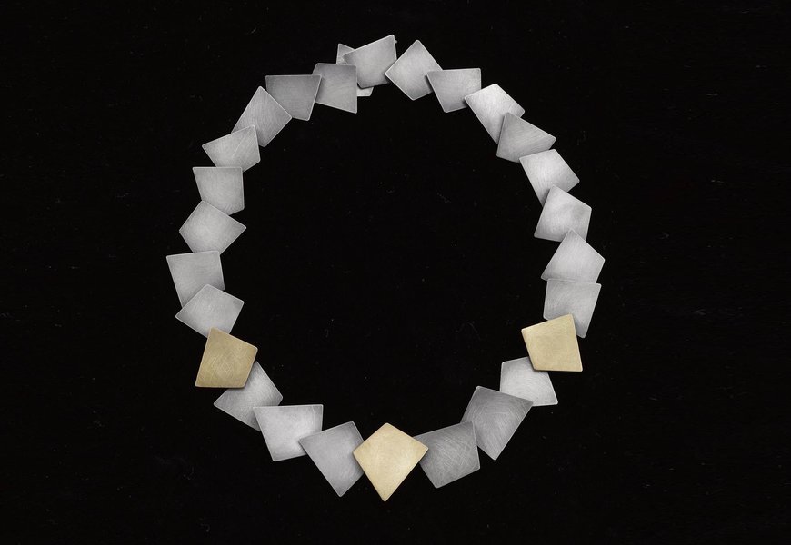 Necklace, 2015, by Daphne Krinos. 18ct yellow gold and silver. 
