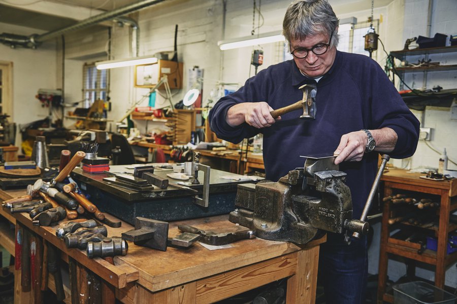 Freeman Phillip Kydd working on Minty® ©The Royal Mint